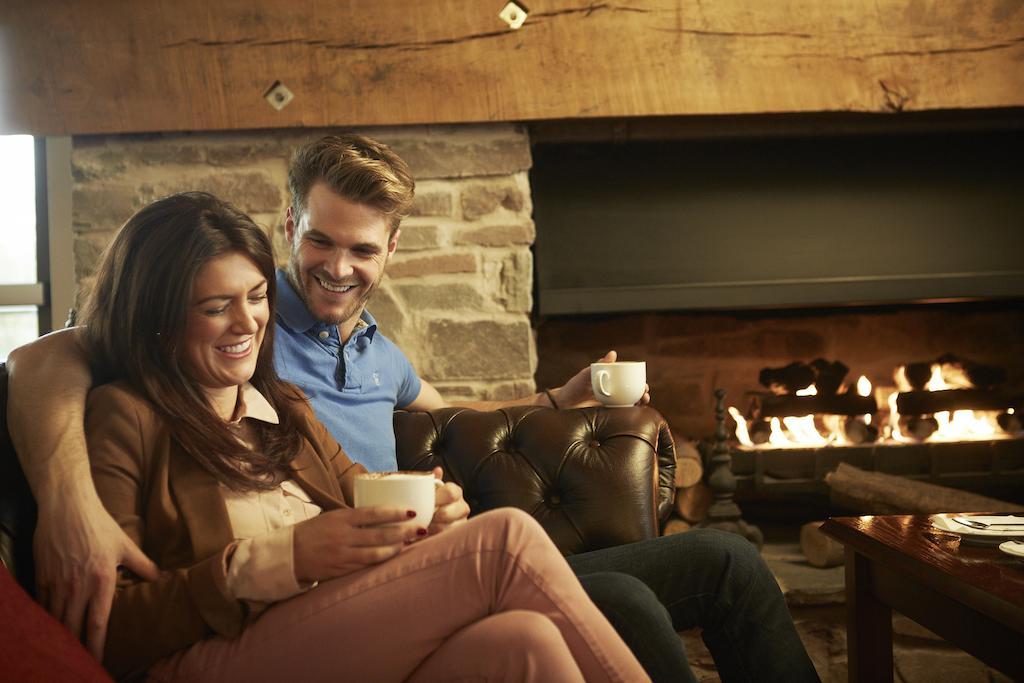 The Celtic Manor Resort Newport  Exterior foto A couple drinking coffee